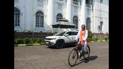 MLAs ride scooters, cycles to oath ceremony to push austerity message