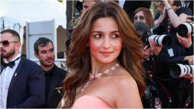 ‘Waving, blowing kisses to her own team’: Shobhaa De calls out Alia Bhatt’s 'peachy look, ill-fitting gown' from Cannes 2026