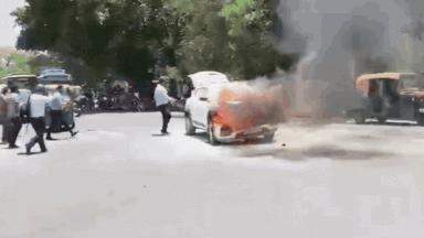 Car bursts into flames on Delhi’s Mehrauli-Badarpur road amid intense heat-Watch