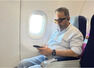 Kamal ditches private charter for economy class flight