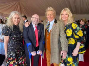 Phil Collins makes a rare appearance at a London celebration