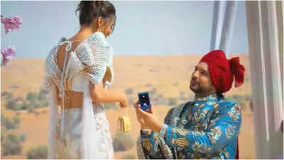Karan Kundrra goes down on one knee to propose to Tejasswi Prakash on Desi Bling; actress gets emotional