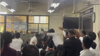 Row at Bar meet over law library posts