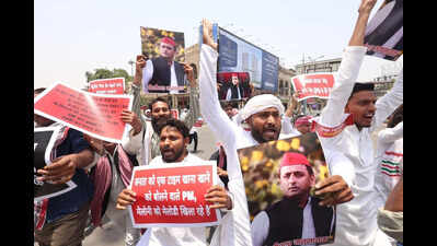 SP youth wings protest NEET paper leak, fuel price hike
