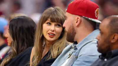 Taylor Swift and Travis Kelce turn Cavaliers game into glamorous date night with surprise courtside appearance in Cleveland