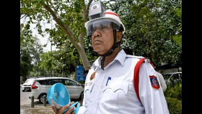 From Heatwaves To Helmets: Delhi Traffic Police Tries Cooling Gear