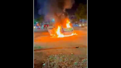 Quick-thinking BJP functionary rescues two from burning car
