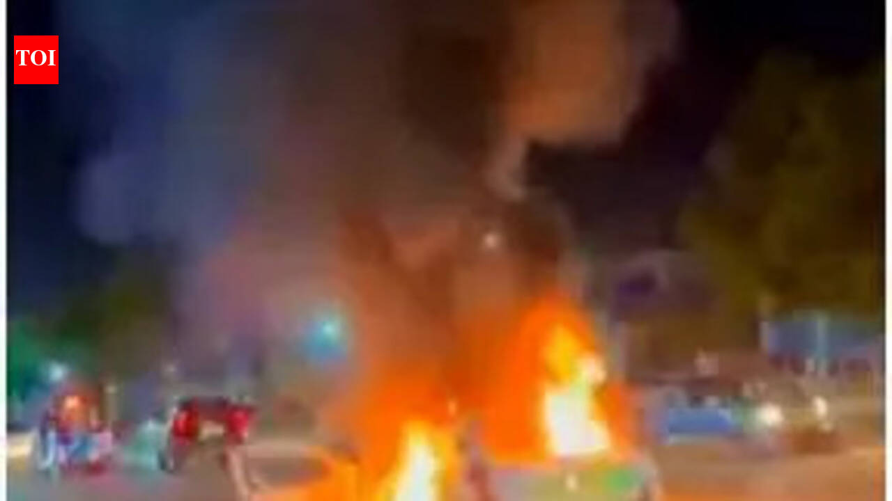 Quick-thinking BJP functionary rescues two from burning car