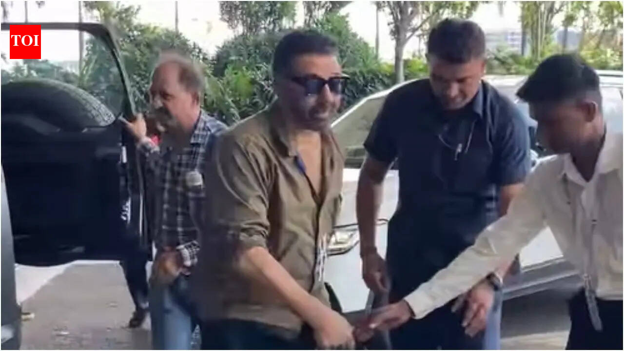 Sunny Deol spotted with wife Pooja Deol at Mumbai airport in RARE public appearance - video