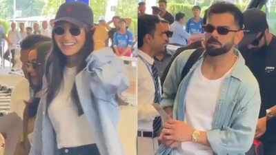 Virat Kohli and Anushka Sharma TWIN at Dharamshala airport, couple all smiles after RCB's victory - WATCH