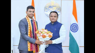 CM felicitates OCS topper Bubun Sahoo