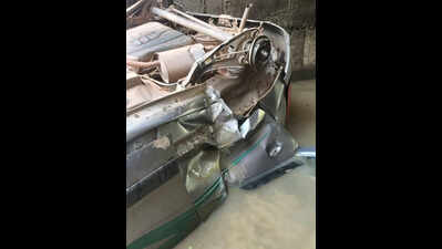 Two youths die as car falls off bridge