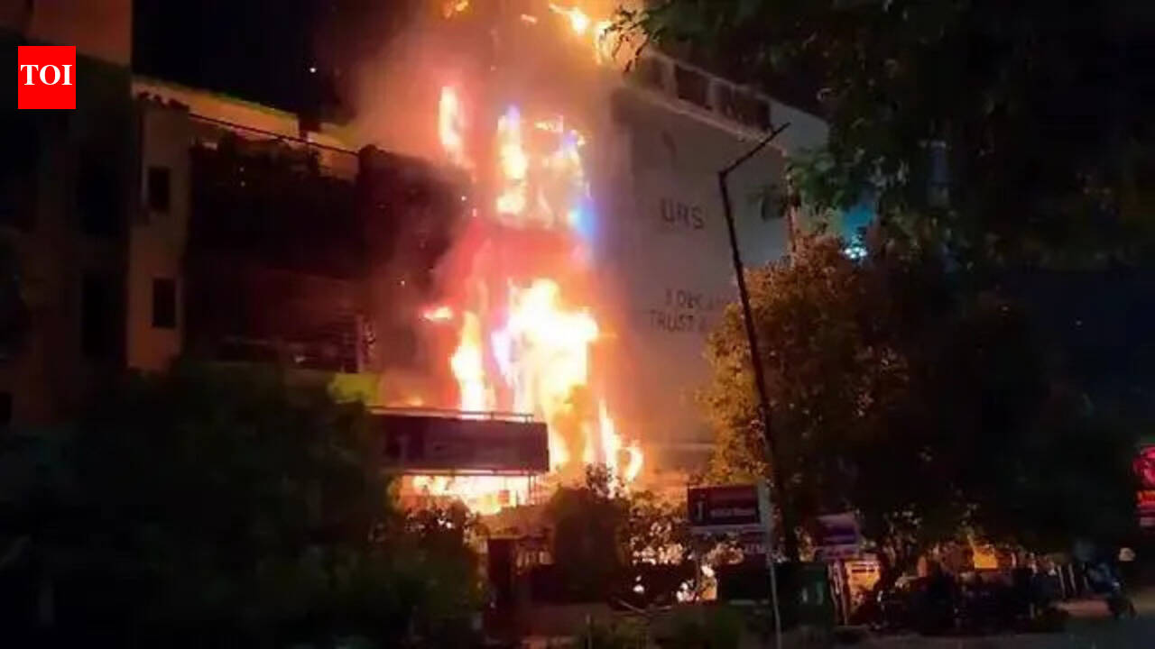 Second fire in a month burns down part of biz complex, nearby flat