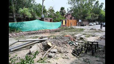 Bricks & signboard fly during Noida storm, leave 2 teens injured