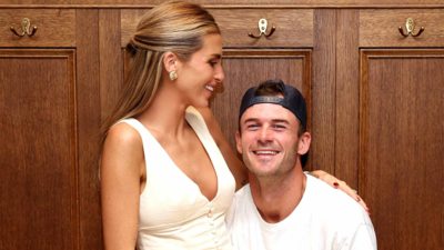 Tommy Paul shares heartfelt courtside kiss with fiance Paige Lorenze while chasing French Open breakthrough