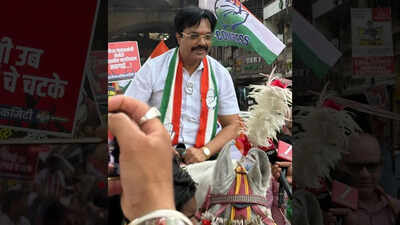 Congress stages unique protest against inflation in Maharashtra's Kalyan; Navin Singh rides horse and distributes chocolates