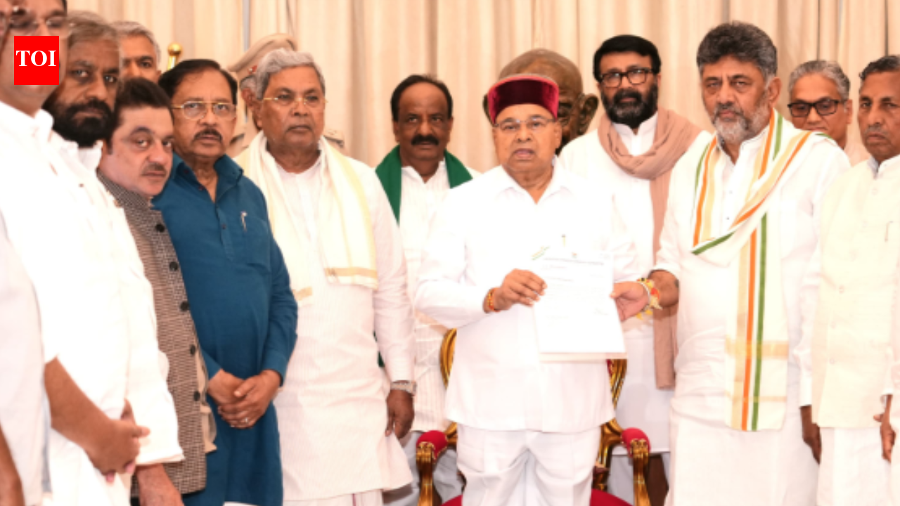 DK Shivakumar meets Karnataka governor, stakes claim to form govt