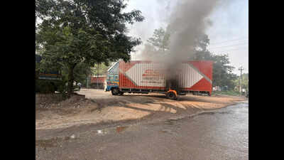 Container touches high-tension wire, driver killed