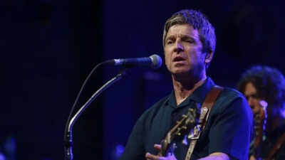 Oasis band member Noel Gallagher sparks romance rumors with a woman 30-years-younger than him