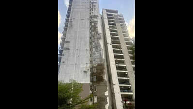 Concrete chunk falls off in condo after storm, injures house help