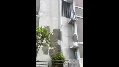 Concrete chunk falls off in condo after storm, injures house help
