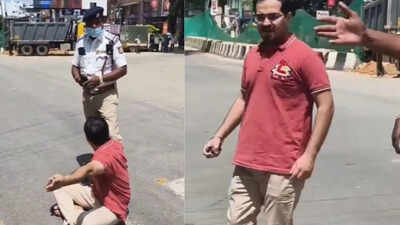 Man sits on road as pregnant wife 'trapped' in traffic jam after VIP convoy stops vehicles in Bengaluru