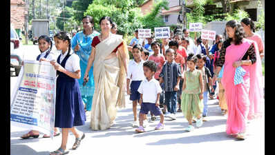 Drumbeats, petals, sweets welcome pupils back at DK schools reopening