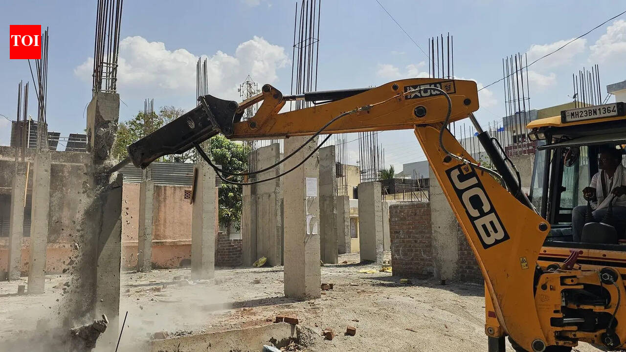 Firm linked to NEET leak accused P V Kulkarni demolishes unauthorised structure after Beed civic body's warning