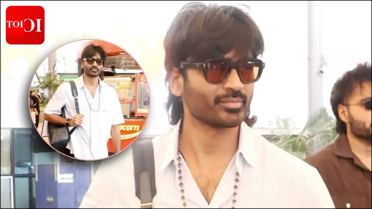 'Kara' star Dhanush spotted at Mumbai airport; exudes casual charm as he greets fans with a smile amid 'D55' buzz