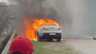 Watch: Moving luxury car catches fire near Noida