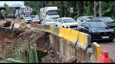 Waterlogging and damaged roads choke traffic in city