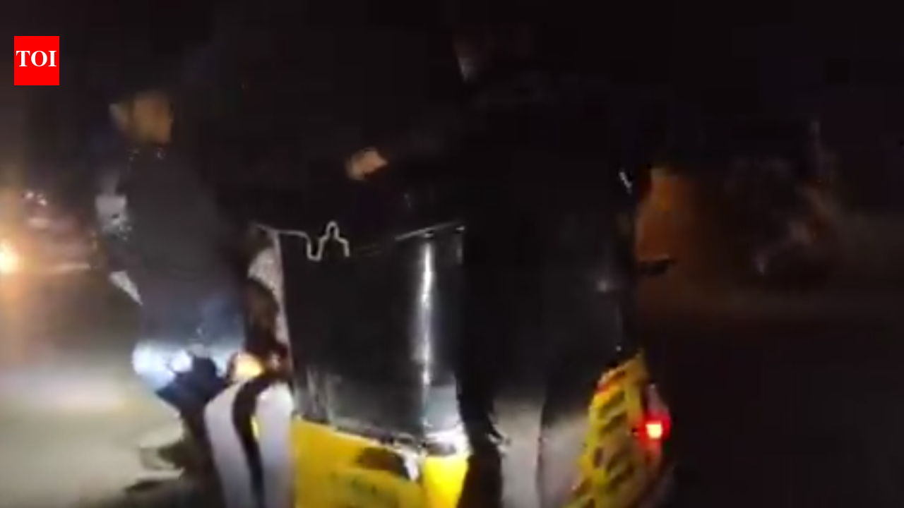 Driver held for ferrying eight passengers in an auto