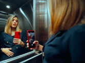 Why do elevators have mirrors inside?