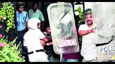 Police bring out fibreglass shield to guard against 'dim-ocracy'