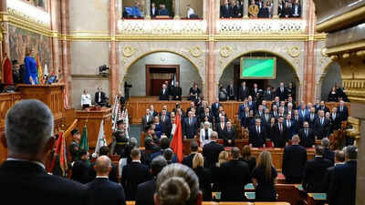 Charity begins at home: Hungary lawmakers vote unanimously to cut salaries by 40% in rare show of political austerity