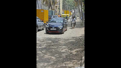 Potholes, dug-up streches turn Haralur Road in Bengaluru into extreme-sports arena