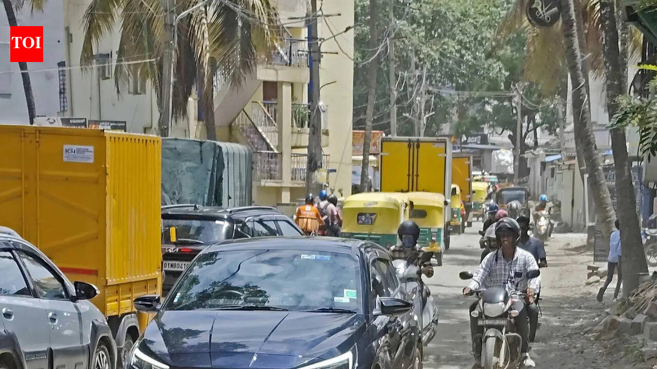 Potholes, dug-up stretches turn Haralur Road in Bengaluru into extreme-sports arena