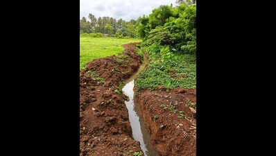 Lamgao villagers angry over trench digging for electricity cables through farm land