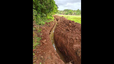 Lamgao villagers angry over trench digging for electricity cables through farm land