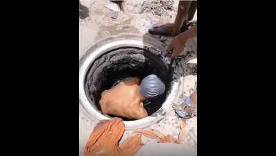No safety gear & machines: Footage shows manual scavenging