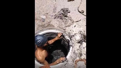 No safety gear & machines: Footage shows manual scavenging
