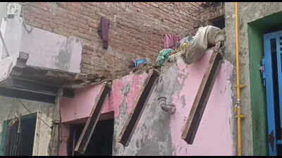 Woman dies as washroom built on balcony caves in