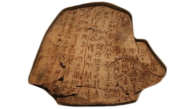 In 1899, a scholar examining dragon bones found carved marks and uncovered Shang China's earliest writing