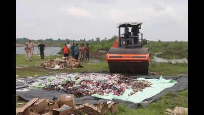 Majuli police use road rollers to crush bottles of illegal liquor, 1,475 litres destroyed