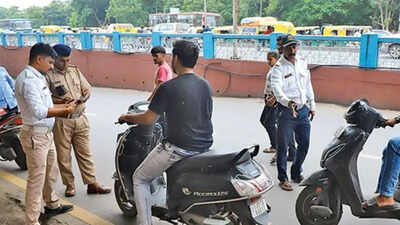 5,123 govt employees fined in Gujarat's month-long helmet drive