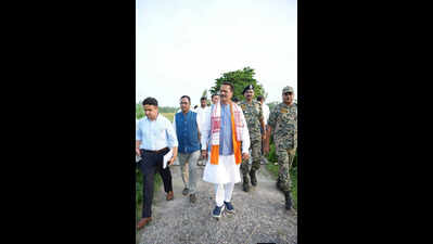 Dhubri guardian min visits village beyond border fence, vows infra development