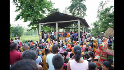 Dhubri guardian min visits village beyond border fence, vows infra development