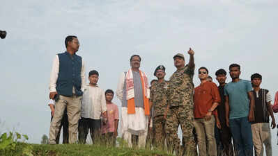 Dhubri guardian min visits village beyond border fence, vows infra development