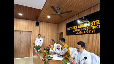 Union min reviews implementation of central schemes in Lower Siang dist