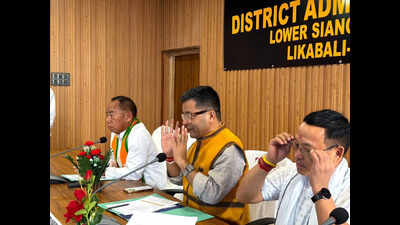 Union min reviews implementation of central schemes in Lower Siang dist
